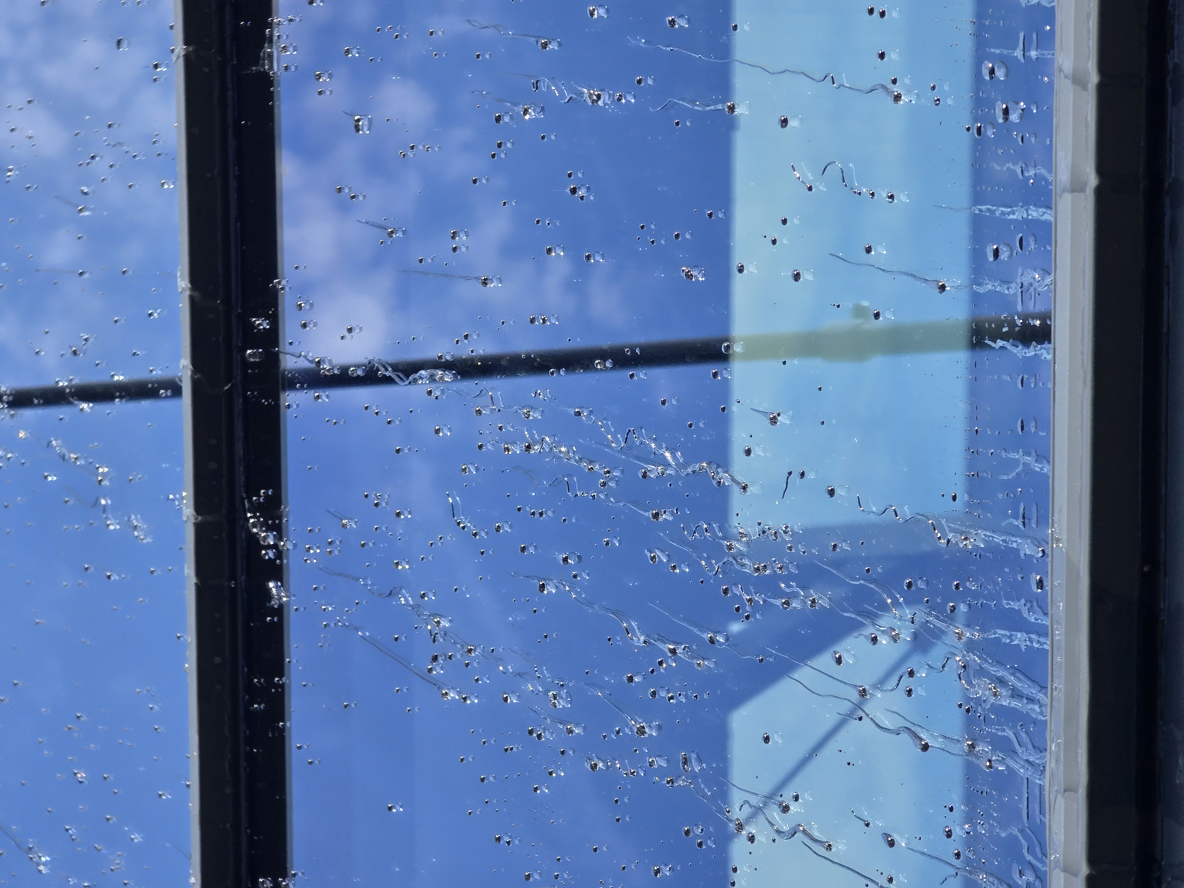 Water beading on coated roof glass